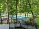 Pickleball courts nestled amongst lush greenery; the perfect spot for an afternoon game at 513 Huntgate Rd, Woodstock, GA 30189