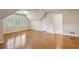 Spacious bedroom with hardwood floors, natural light, and an ensuite bathroom, creating a serene retreat at 640 Sibley Se Frst, Marietta, GA 30067