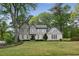 Charming two-story home with a manicured lawn and mature trees offers classic curb appeal at 640 Sibley Se Frst, Marietta, GA 30067