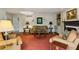 Open concept living room with fireplace and hardwood floors and a comfortable sitting area for entertaining at 640 Sibley Se Frst, Marietta, GA 30067