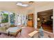 Cozy sunroom features tiled floor, skylights, and access to both the exterior patio and the main living area at 640 Sibley Se Frst, Marietta, GA 30067