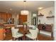 Cozy dining area adjacent to the kitchen, featuring hardwood floors and stylish decor at 104 Fairway Overlook, Woodstock, GA 30188