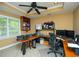 Inviting home office with built-in shelves and a large desk at 104 Fairway Overlook, Woodstock, GA 30188