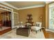 Cozy living room with neutral decor, plush seating, and ample natural light at 104 Fairway Overlook, Woodstock, GA 30188