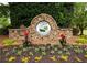 Creekside at Bradshaw Farm entrance sign with colorful landscaping at 104 Fairway Overlook, Woodstock, GA 30188