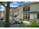 Backyard view highlighting the deck, patio, and landscaped yard at 1294 Fernwood Ne Cir, Brookhaven, GA 30319