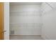 Walk-in closet with shelving and carpet flooring at 1294 Fernwood Ne Cir, Brookhaven, GA 30319