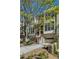 Striking townhouse with a brick facade, multiple windows, brick steps and a garage for convenient parking at 1294 Fernwood Ne Cir, Brookhaven, GA 30319