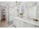 Modern bathroom featuring dual vanity, glass shower, and stylish lighting at 135 Channing Ln, Fayetteville, GA 30214