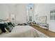 Bright bedroom with tall ceilings, large windows and stylish decor at 135 Channing Ln, Fayetteville, GA 30214
