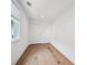Bright and airy room with light colored hardwood flooring and a large window at 135 Channing Ln, Fayetteville, GA 30214