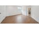 Bright bedroom with hardwood floors and en suite bathroom; a private, cozy space at 135 Channing Ln, Fayetteville, GA 30214