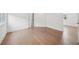 Bedroom with hardwood floors, white trim and doors, and lots of natural light at 135 Channing Ln, Fayetteville, GA 30214