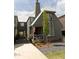 Charming home with a covered porch, gray siding, and stone landscaping at 135 Channing Ln, Fayetteville, GA 30214