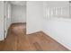 Hallway with wooden floors and walls at 135 Channing Ln, Fayetteville, GA 30214