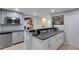 Finished basement with wet bar, sink, and cabinets at 220 Autumn Sage Dr, Alpharetta, GA 30005