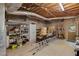 Unfinished basement storage featuring exposed ductwork, shelving, and ample floor space at 220 Autumn Sage Dr, Alpharetta, GA 30005
