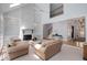 Bright living room with vaulted ceilings, fireplace, and a view of the upstairs at 220 Autumn Sage Dr, Alpharetta, GA 30005