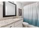 Bathroom features granite countertop, modern fixtures, and shower with curtain at 3051 Deanna Way, Lawrenceville, GA 30044