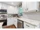 Close up view of kitchen featuring stainless steel appliances and granite countertops at 3051 Deanna Way, Lawrenceville, GA 30044