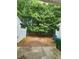 View of the backyard with mature trees and a privacy fence for outdoor enjoyment at 3336 Waldrop Trl, Decatur, GA 30034