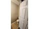 This bathroom features a standard toilet, tile floor, and neutral wall paint at 3336 Waldrop Trl, Decatur, GA 30034
