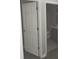 A bathroom with a toilet, a sink, and gray floor at 3336 Waldrop Trl, Decatur, GA 30034