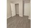 Bedroom with closet and neutral paint and hard wood floors at 3336 Waldrop Trl, Decatur, GA 30034