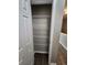 Walk in closet with white wire shelving and neutral paint, providing efficient storage space in the home at 3336 Waldrop Trl, Decatur, GA 30034