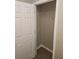 Small closet with a wire shelf and neutral walls, perfect for additional storage at 3336 Waldrop Trl, Decatur, GA 30034