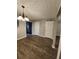 Dining room area with vinyl floors and a chandelier at 3336 Waldrop Trl, Decatur, GA 30034