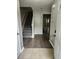 Inviting foyer with durable flooring and staircase, showcasing a welcoming entrance at 3336 Waldrop Trl, Decatur, GA 30034