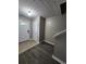 Inviting foyer featuring modern flooring, neutral walls, and a bright front door at 3336 Waldrop Trl, Decatur, GA 30034