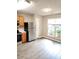 Bright kitchen featuring stainless steel appliances, light-colored cabinets, and lots of natural light from the window at 3336 Waldrop Trl, Decatur, GA 30034
