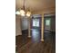 Spacious living room with hardwood floors, a ceiling fan, and plenty of natural light at 3336 Waldrop Trl, Decatur, GA 30034