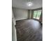 Inviting living room filled with natural light, neutral walls, and sleek flooring at 3336 Waldrop Trl, Decatur, GA 30034
