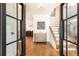 Inviting foyer showcasing hardwood floors, staircase, and decorative elements, leading to the living spaces at 4175 Valley Trail Se Dr, Atlanta, GA 30339