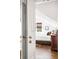 This bedroom features a slanted ceiling, and door to another room at 2029 Tuxedo Ne Ave, Atlanta, GA 30307