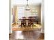 Traditional dining room with hardwood floors and natural light at 2029 Tuxedo Ne Ave, Atlanta, GA 30307