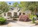 Charming two-story home with beautifully landscaped front yard, manicured lawn, and inviting curb appeal at 2029 Tuxedo Ne Ave, Atlanta, GA 30307