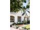 Charming two-story home with beautifully landscaped front yard, and an inviting front porch at 2029 Tuxedo Ne Ave, Atlanta, GA 30307