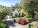 Charming two-story home with beautifully landscaped front yard, manicured lawn, and inviting curb appeal at 2029 Tuxedo Ne Ave, Atlanta, GA 30307