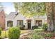 Charming single-story home featuring a manicured front yard and classic architectural details at 2029 Tuxedo Ne Ave, Atlanta, GA 30307
