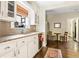 Bright kitchen with granite countertops and white cabinetry at 2029 Tuxedo Ne Ave, Atlanta, GA 30307