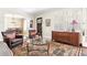Spacious living room with an archway, dark trimmed windows and hardwood floors at 2029 Tuxedo Ne Ave, Atlanta, GA 30307