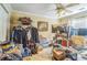 Cluttered bedroom with lots of personal belongings and furnishings; needs cleaning at 2602 White Aster Ln, Dacula, GA 30019