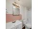Modest bathroom with pink tile, standard white fixtures, and a functional layout at 2650 Gwendon Ct, Decatur, GA 30034