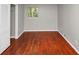 A simple bedroom with hardwood floors, a window, and a closet ready for personalization at 2650 Gwendon Ct, Decatur, GA 30034