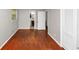 This bedroom features hardwood floors, light gray walls, and easy access to a nearby bathroom and closet at 2650 Gwendon Ct, Decatur, GA 30034