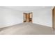 Spacious primary bedroom with modern doors and neutral carpet at 1095 Lanier Pl, Cumming, GA 30041